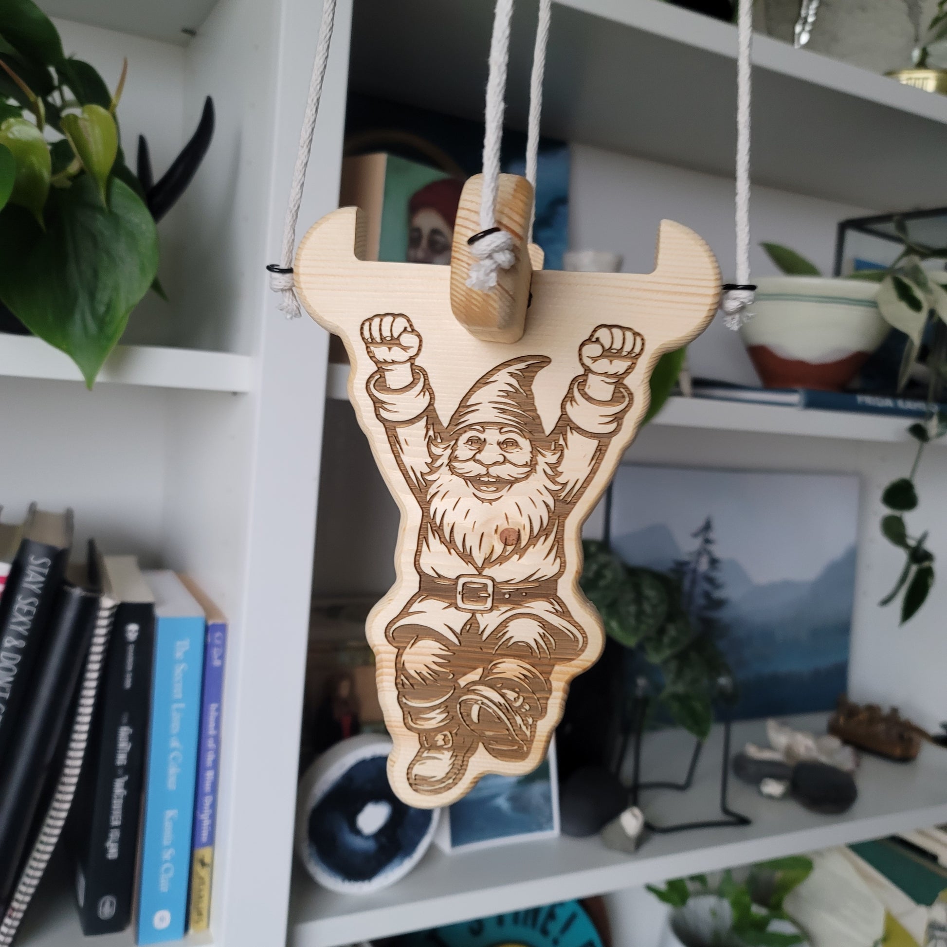 Wooden plant hanger with a gnome design 