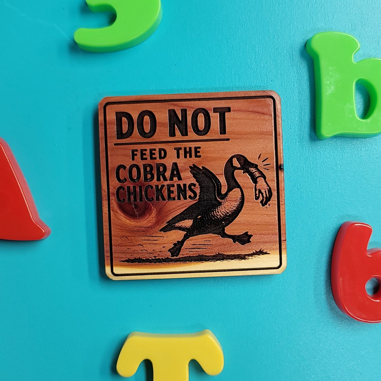 Do Not Feed The Cobra Chickens (Canada goose) Fridge Magnet
